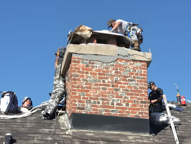 Azusa Chimney Sweep installing a custom chimney crown in Azusa, CA
