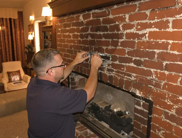 Azusa Chimney Sweep expert fixing a fireplace in Azusa, CA